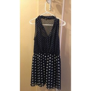A navy blue polkadot dress